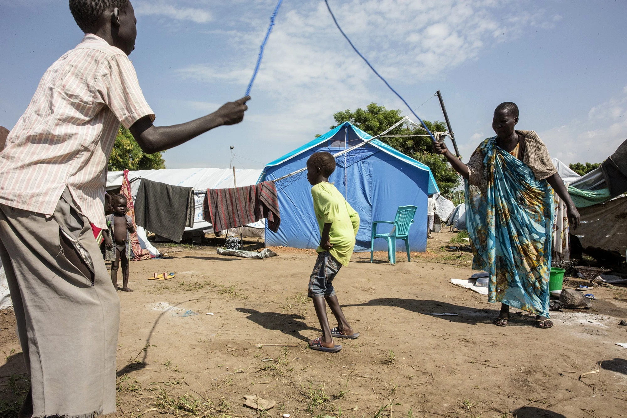 Displaced children residing at a United Nations transit site in South Sudan take time to play. © UN Photo/Isaac Billy