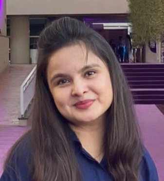 South Asian woman with long hair