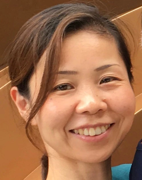 Kyoko Okamura smiling to camera