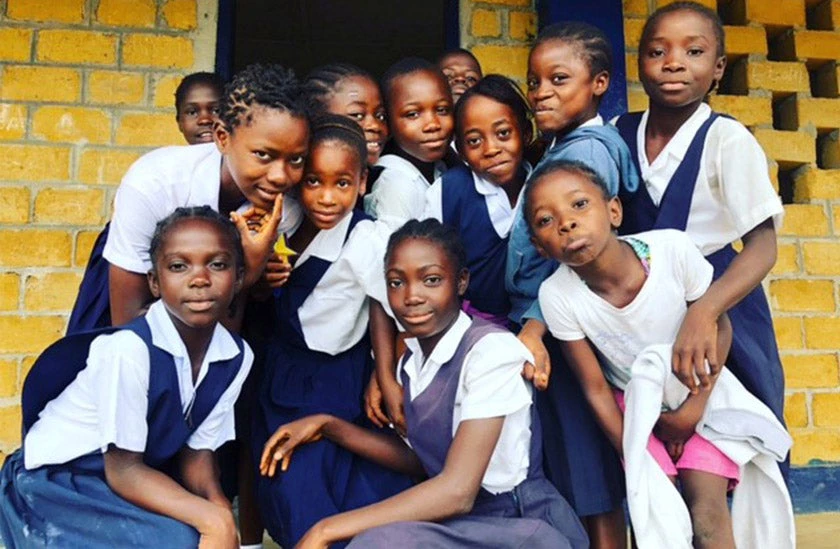 Female students in Liberia posing for a photo