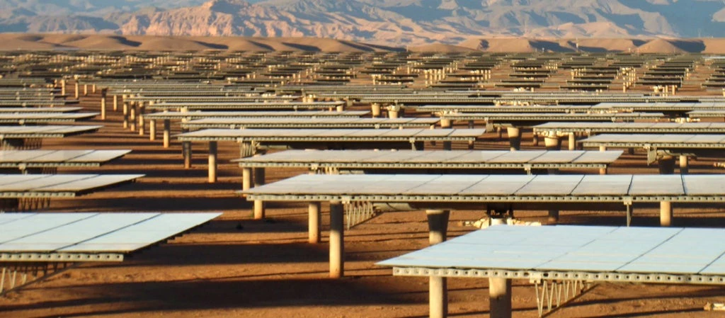 Field of solar mirrors at the Noor Ouarzazate Concentrated Solar Power (CSP) Complex in Morocco 