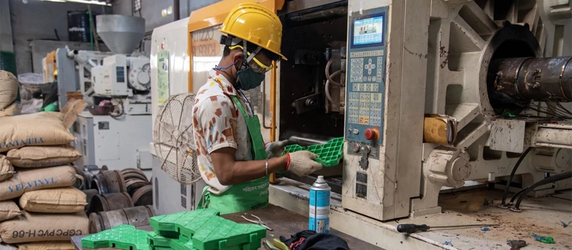 Plastic tile production in Bangladesh.