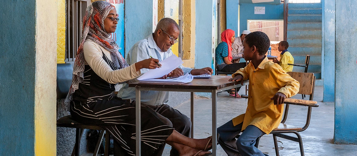 A young boy during exam at school in Harar, Ethiopia, Africa