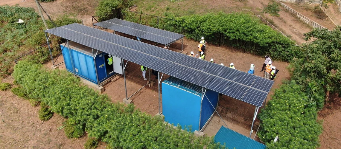 Photo of African workers are installing solar panels.