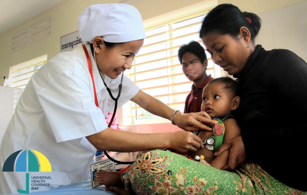 A trained medical staff listens to the heartbeat of an infant at a hospital in Preah Vihear, Cambodia. Photo: Chhor Sokunthea / World Bank