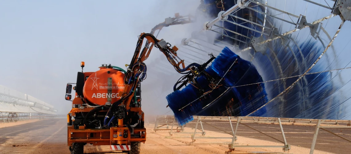 Truck sprays blue liquid on solar panels