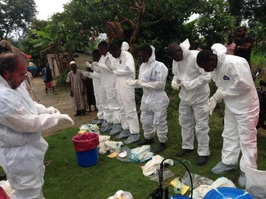 WHO team are preparing to remove dead bodies of people who died from Ebola.
