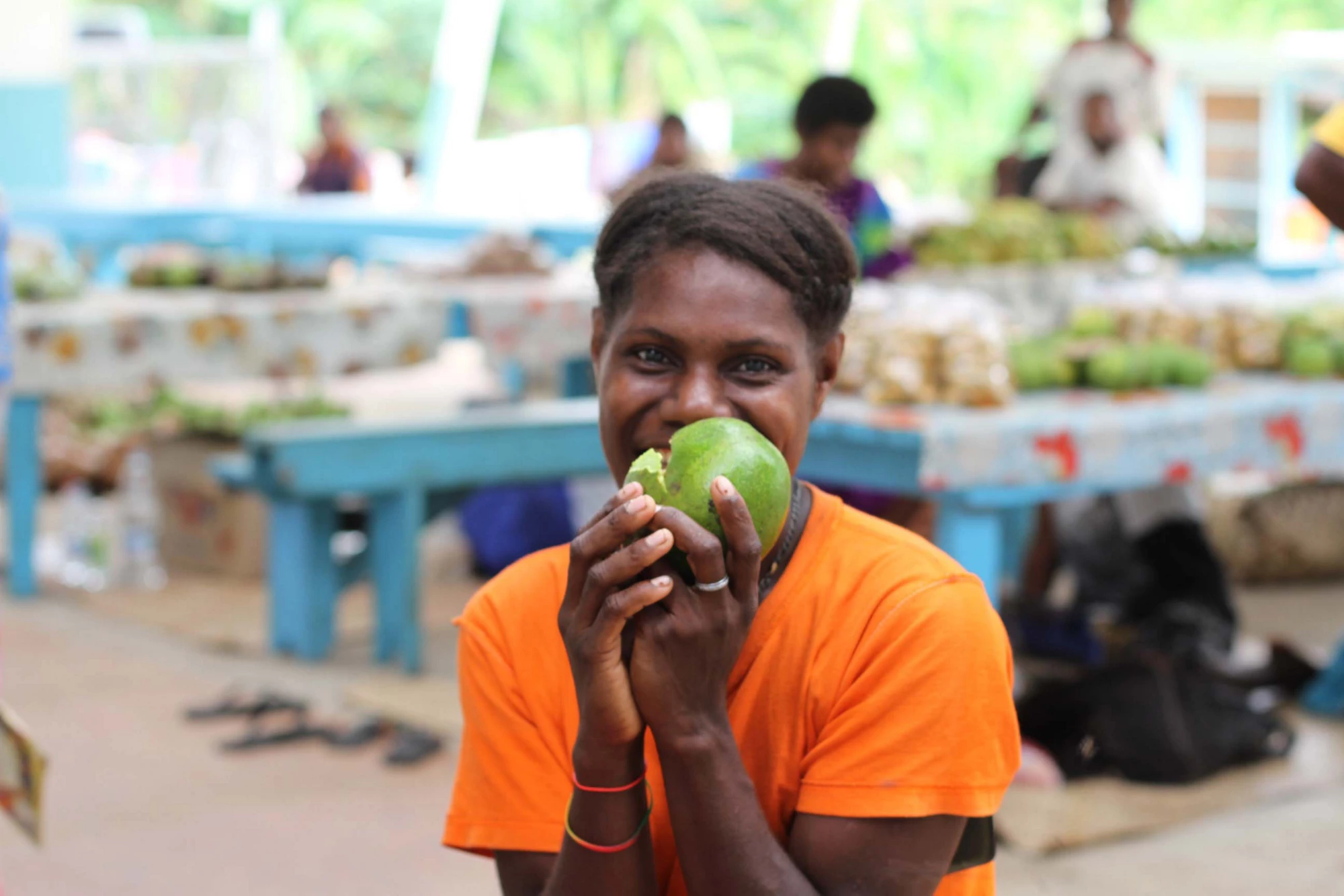 woman in a market Pacific Islands