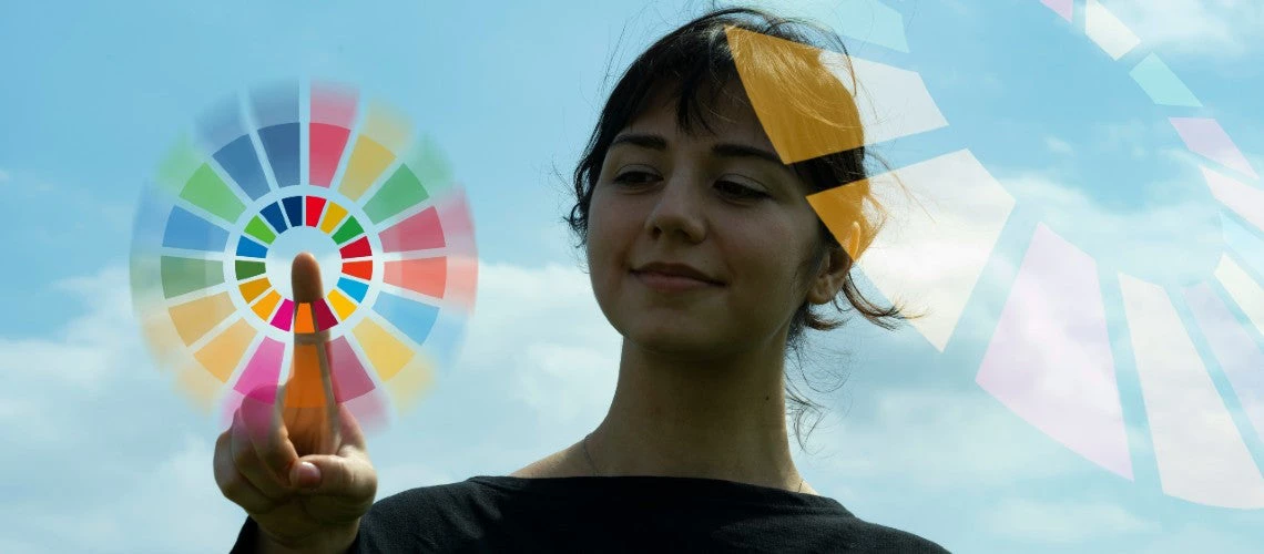 Symbol color of Sustainable Development Goals and silhouette of female
