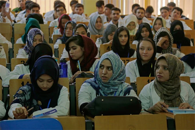 Afghan students attending their class in Kabul University