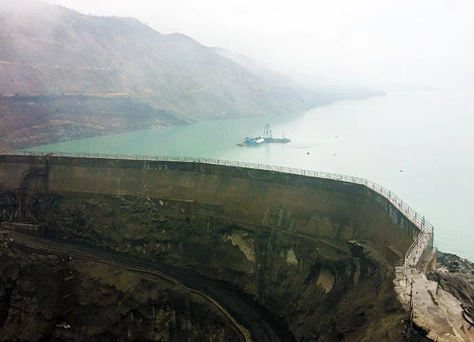 The Tarbela dam in Pakistan staddles the Indus River. The earth- and rock-filled structure is almost 500 feet high and 9,000 feet wide