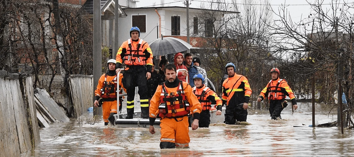 Civil emergency forces helping local population in Fushë-Kruja during a flood emergency situation, 2021
