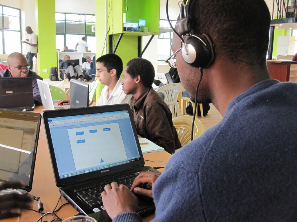 Participants gather at a hackathon in Nairobi, Kenya (Photo by Flickr user Erik (HASH) Hersman)