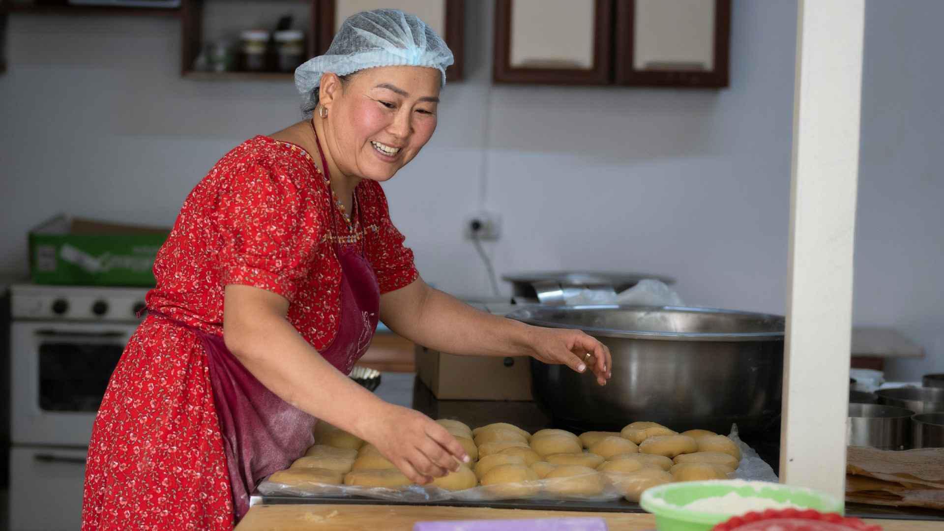 Small business owner and baker Nazgul Attokurova Kyrgyzstan prepared rolls to sell.
