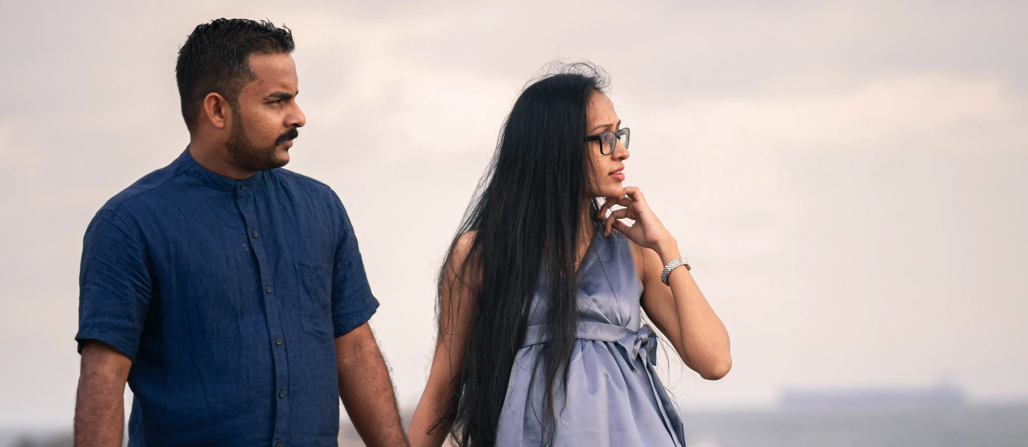 South Asian, Sri Lankan couple Holding hands in the evening