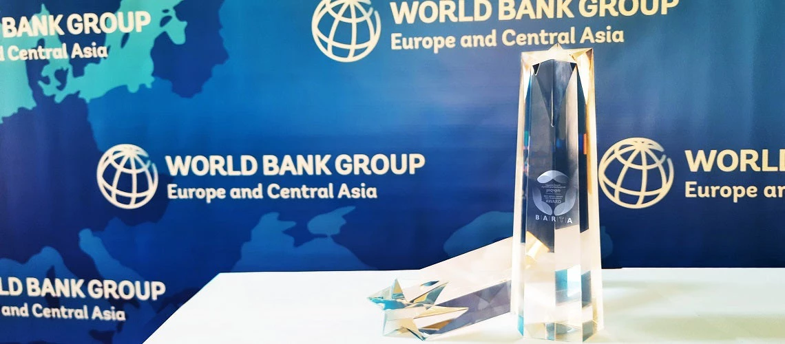 BARTA Award on table in front of World Bank Group banner