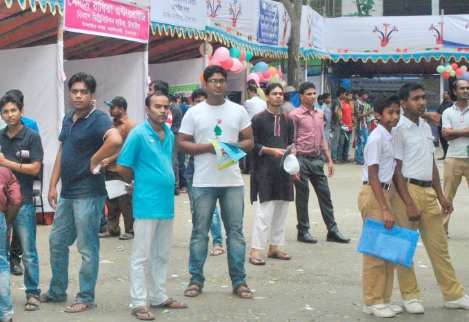 Aspiring migrants visiting the SMBW Migration Fair in Tangail