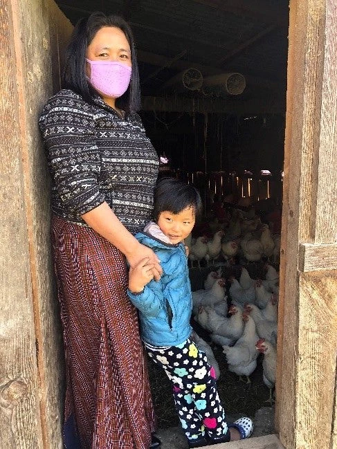 Dechen, poultry farmer and beneficiary of the Remote Rural Communities Development Project