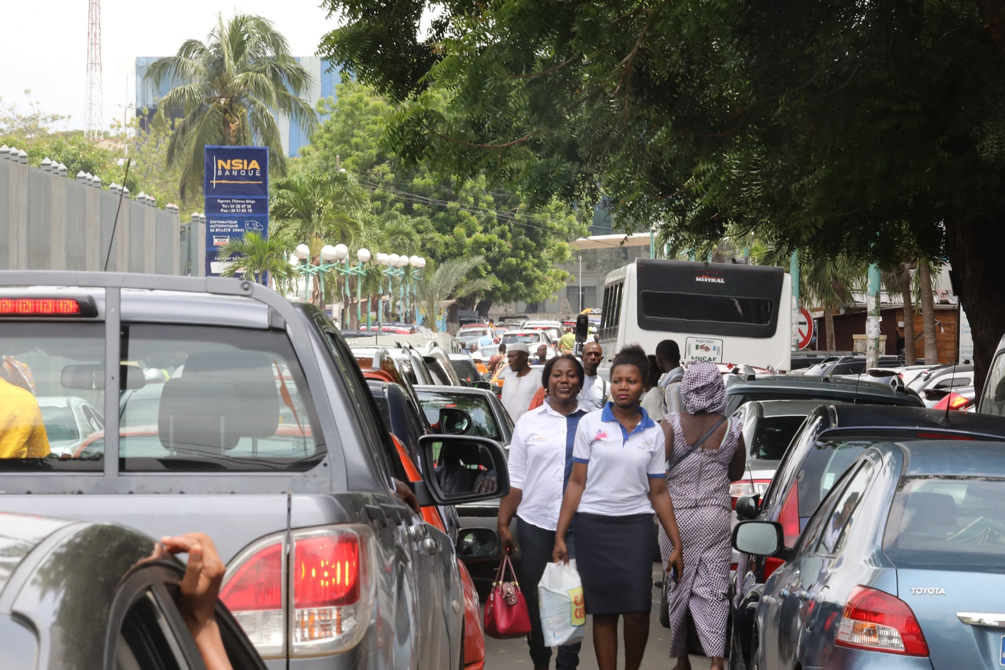 People walking in traffic