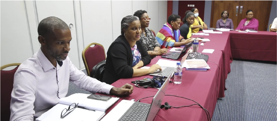 officials at a roundtable in Saint Lucia