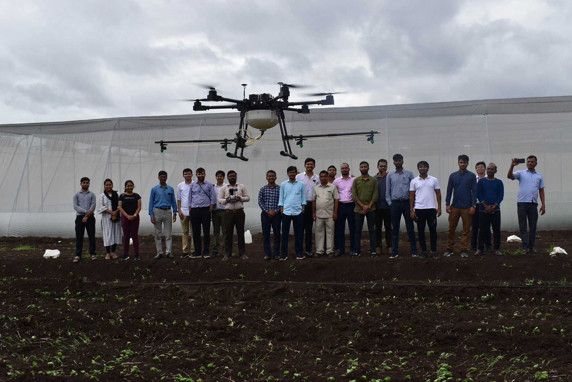 A drone based spraying demonstration was conducted at a campus to create awareness and promotion of drone technology. 