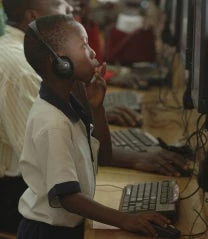 A boy works at a computer center in Accra, Ghana. © Jonathan Ernst/World Bank