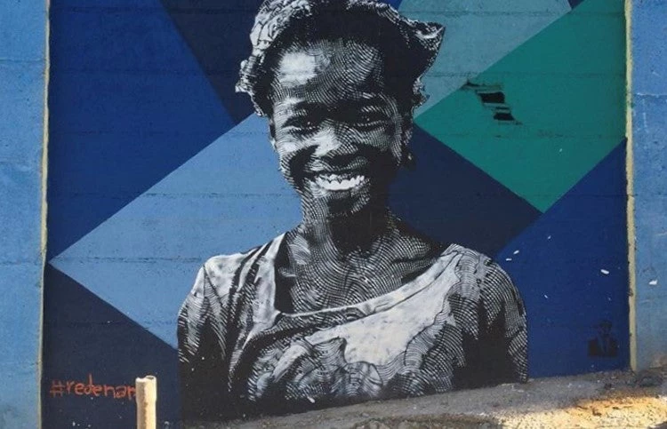Mural painting of a young woman in Brazil.