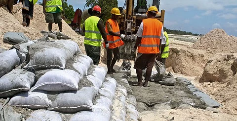 Building a sea wall in Kiribati. Lauren Day/World Bank