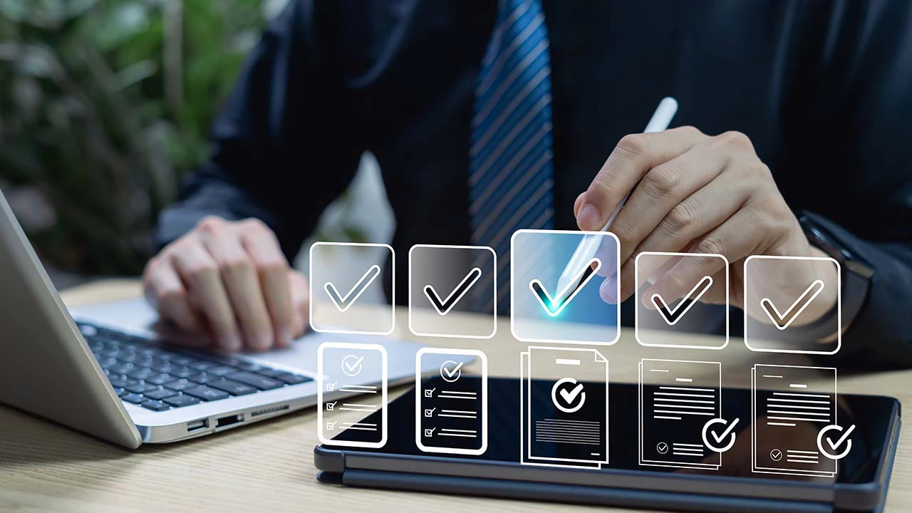 Business person using smart technology for digital data verification.