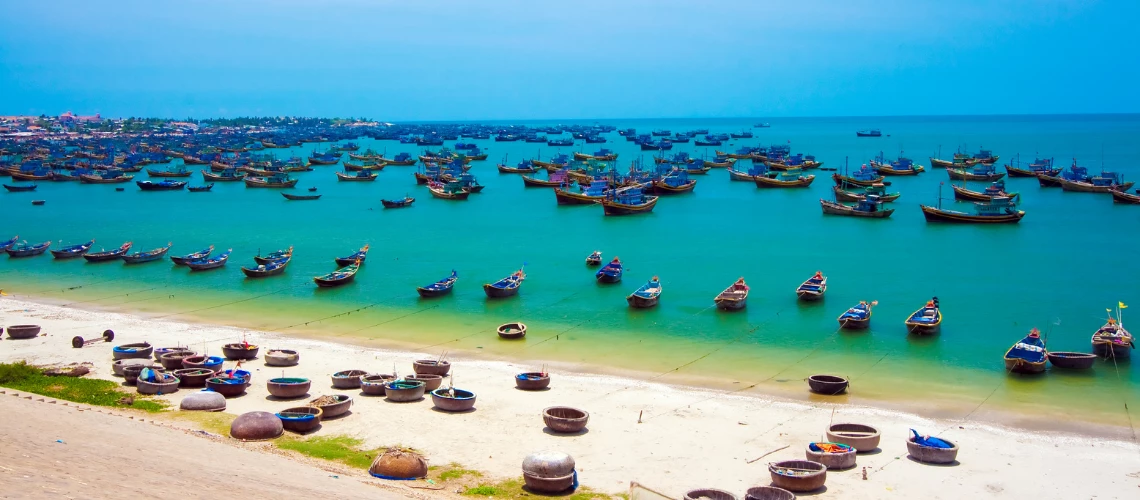 Mui Ne fishing village in the South of Vietnam with a lot of boats