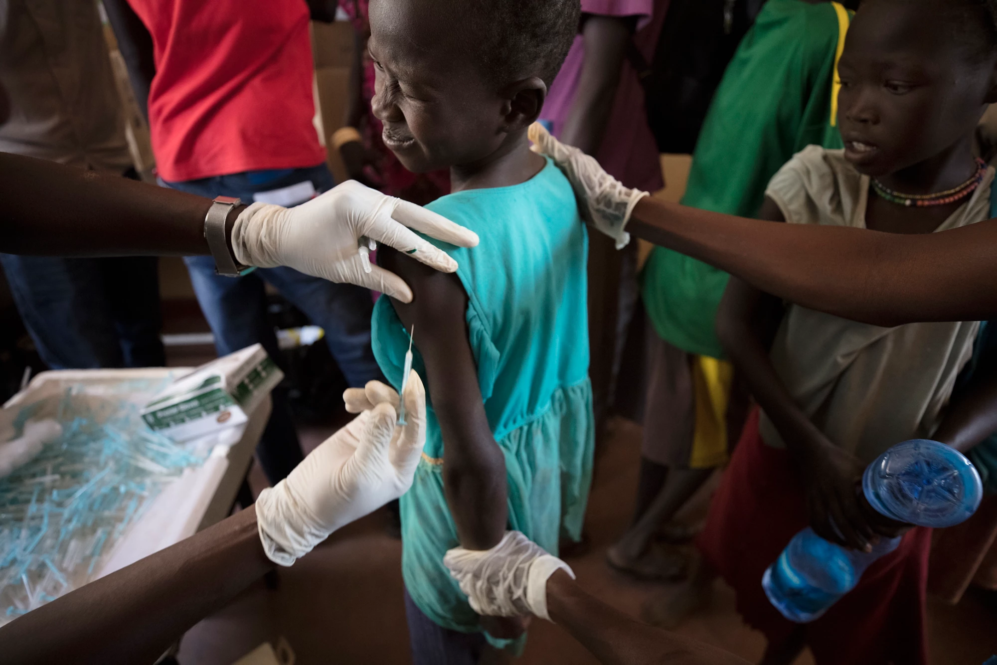 UNHCR helps hundreds of refugees cross the border near Nadapal, Kenya as they flow in from South Sudan on February 6, 2018. UNHCR also vaccinated the children before transporting everyone to Kakuma Rufugee Camp, in Kakuma Kenya that same day. Photo © Dominic Chavez/International Finance Corporation 

 
 



 


 
 

 



















