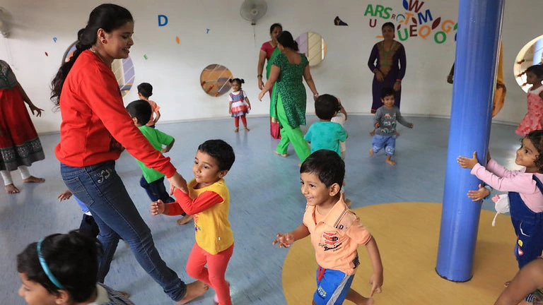 Children play games and have class exercises at Little Critters daycare center at Mindtree in Bangalore, India. © Dominic Chavez/International Finance Corporation