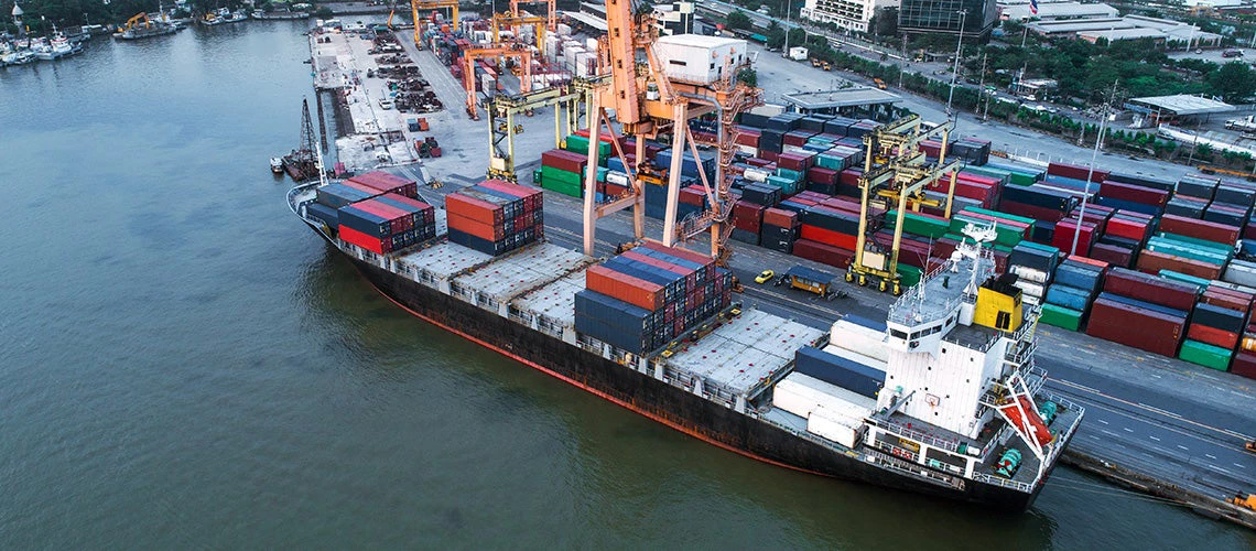 Cargo Ship at port. | © shutterstock.com