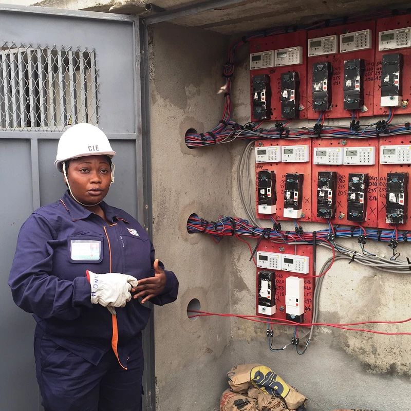 A crew leader of CIE, a power company working to connect low-income homes to the electric grid in Cote d'Ivoire. Photo by World Bank