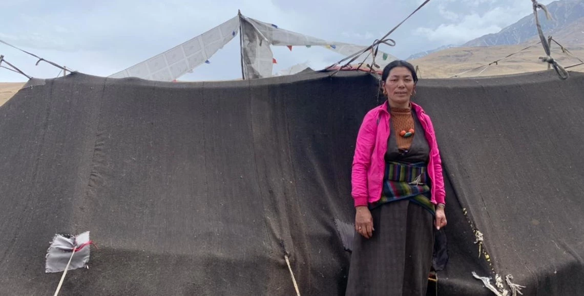Phurbu Dolma from Nepal's Upper Mustang stands in front of her family tent made of yak hair. Photo: Jampa Phunchok 