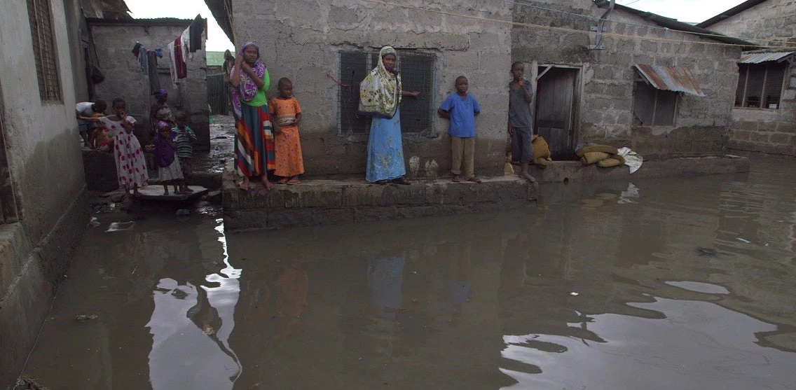 Local residents wait for waters to subside in Dar es Salaam, Tanzania