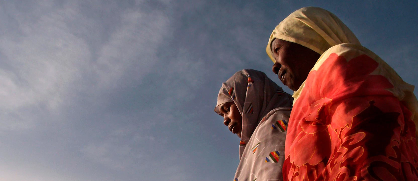 Two women look out over the White Nile