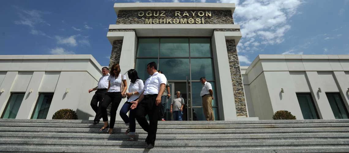 young professionals walking outside of an Central Asian bank