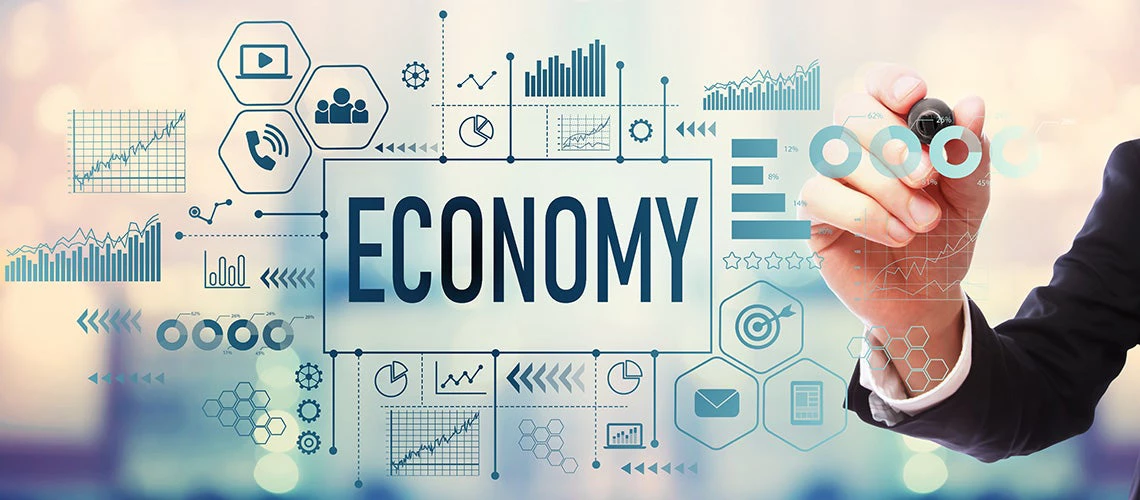 The Word "Economy" with businessman on blurred abstract background. | © Adobe Stock