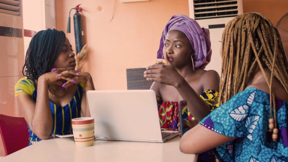 group of young women discussing together