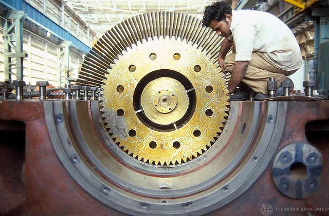 Worker in a factory in India. Photo - Ray Witlin / World Bank.