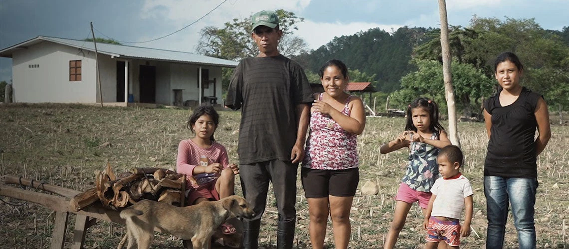  Latin American family of six. The father has a disability. 