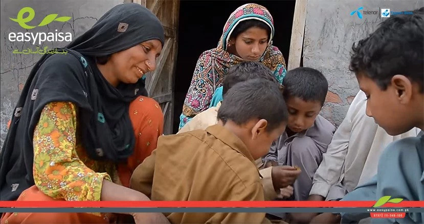 Easypaisa Pakistan Health Insurance Blog - Family Eating (from a Telenor Pakistan promotional video for Easypaisa)