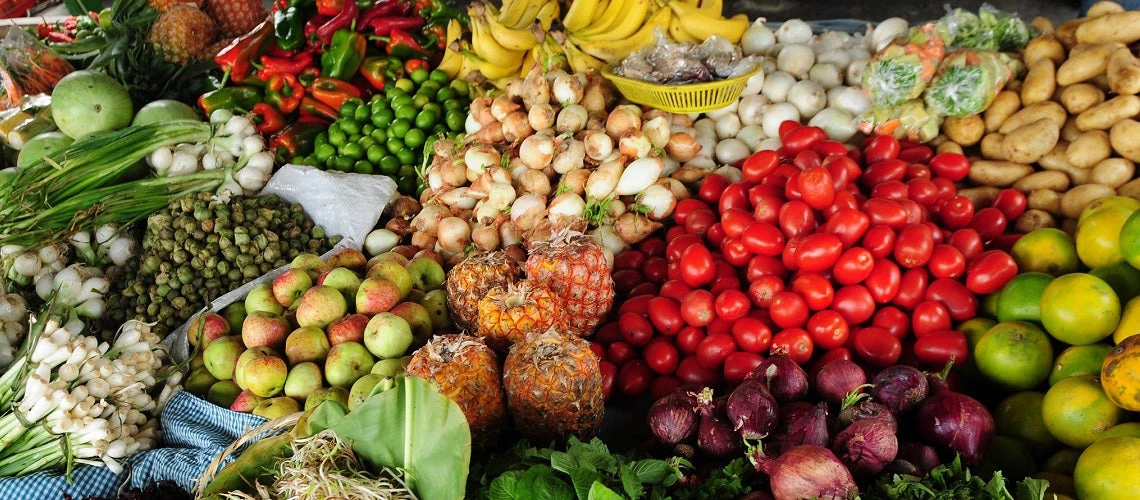 Fruits, vegetables and greens, for sale in a market in Guatemala City