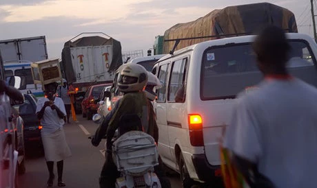 Trucks idling in traffic in Ghana. Jonathan Ernst/World Bank