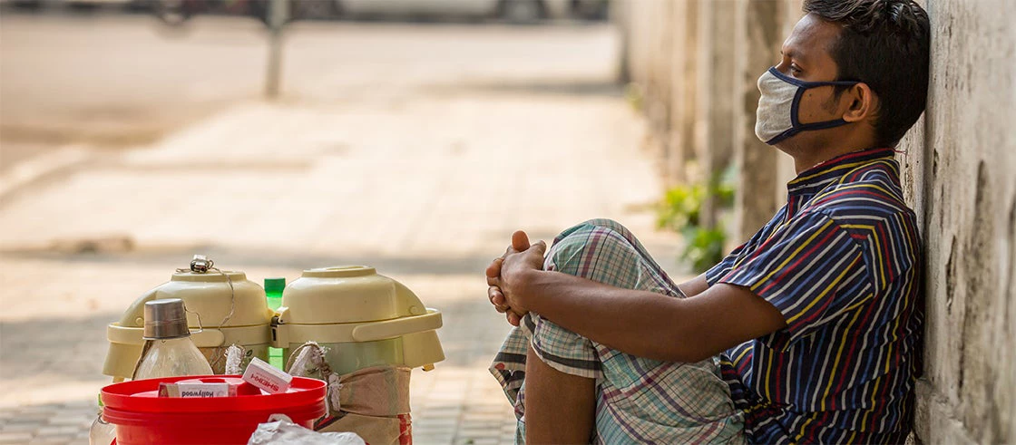 A street vendor in Dhaka, Bangladesh during COVID-19 pandemic - May, 2020. Photo - Md Shanjir Hossain / Shutterstock.com