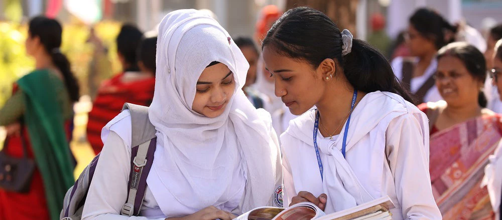 Two young Bangaldeshis at a book festival 