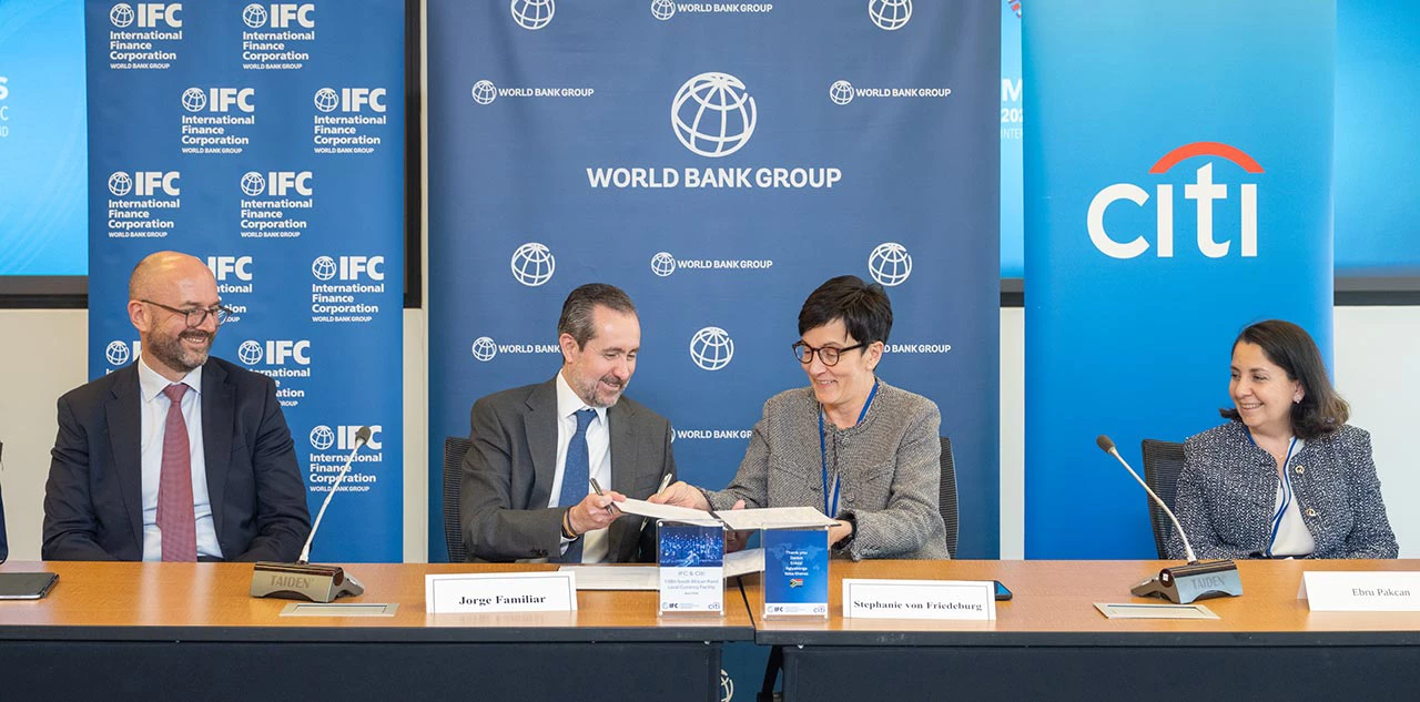 A photograph from the signing ceremony.