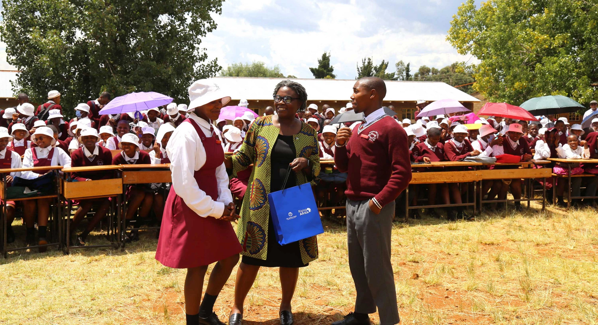 Addressing students at Morapeli High School, part of our work aims to support students to become healthy, educated, and productive individuals. Photo: Cheryl Khuphe / World Bank