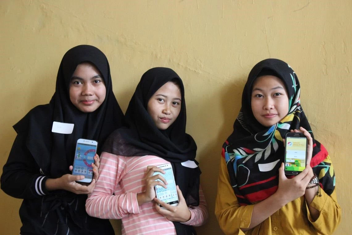 Oky is a free period-tracking app used by UNICEF in a pilot program to help adolescent girls in Mongolia and Indonesia learn about menstruation. Photo: © NH Handayani/UNICEF